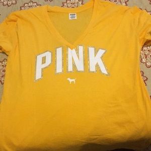 Large yellow “Pink”shirt
